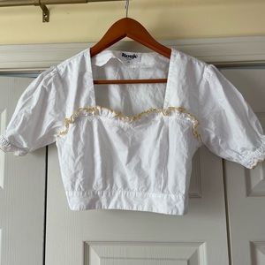 White and yellow blouse
